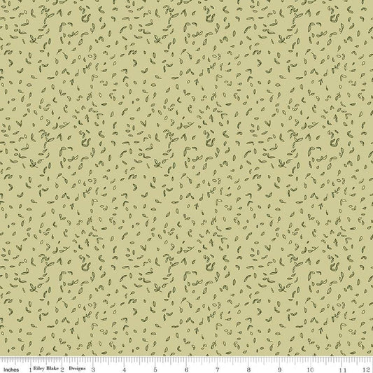 Image of Tangled Gardens Seedlings Celery quilting cotton fabric by Diane Labombarbe for Riley Blake Designs. Features leaves on a green background. Cute Little Fabric Shop.