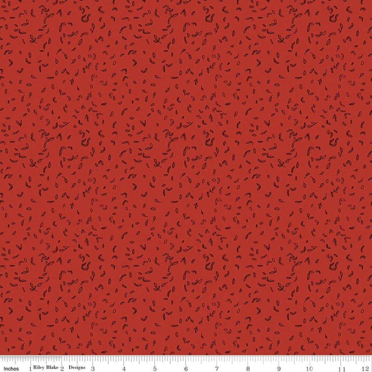Image of Tangled Gardens Seedlings Red quilting cotton fabric by Diane Labombarbe for Riley Blake Designs. Features leaves on a red background. Cute Little Fabric Shop.