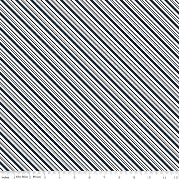 Image of A Perfect Winter Stripes Navy quilting cotton fabric by Lori Whitlock for Riley Blake Designs. Features stripes on a blue background. Cute Little Fabric Shop.