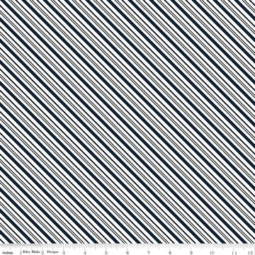 Image of A Perfect Winter Stripes Navy quilting cotton fabric by Lori Whitlock for Riley Blake Designs. Features stripes on a blue background. Cute Little Fabric Shop.