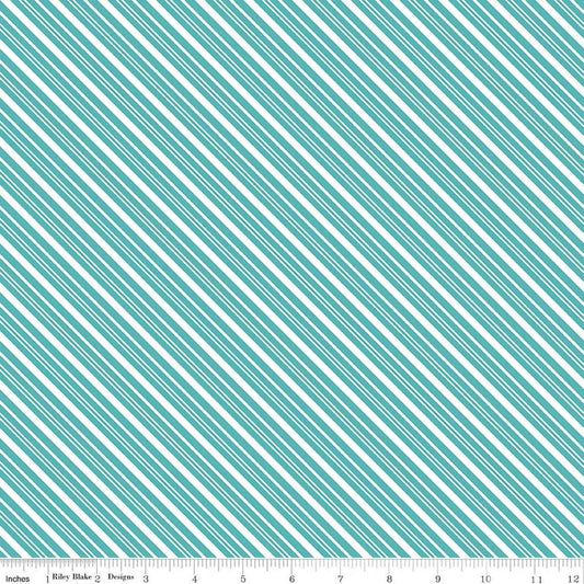 Image of A Perfect Winter Stripes Blue quilting cotton fabric by Lori Whitlock for Riley Blake Designs. Features stripes on a blue background. Cute Little Fabric Shop.