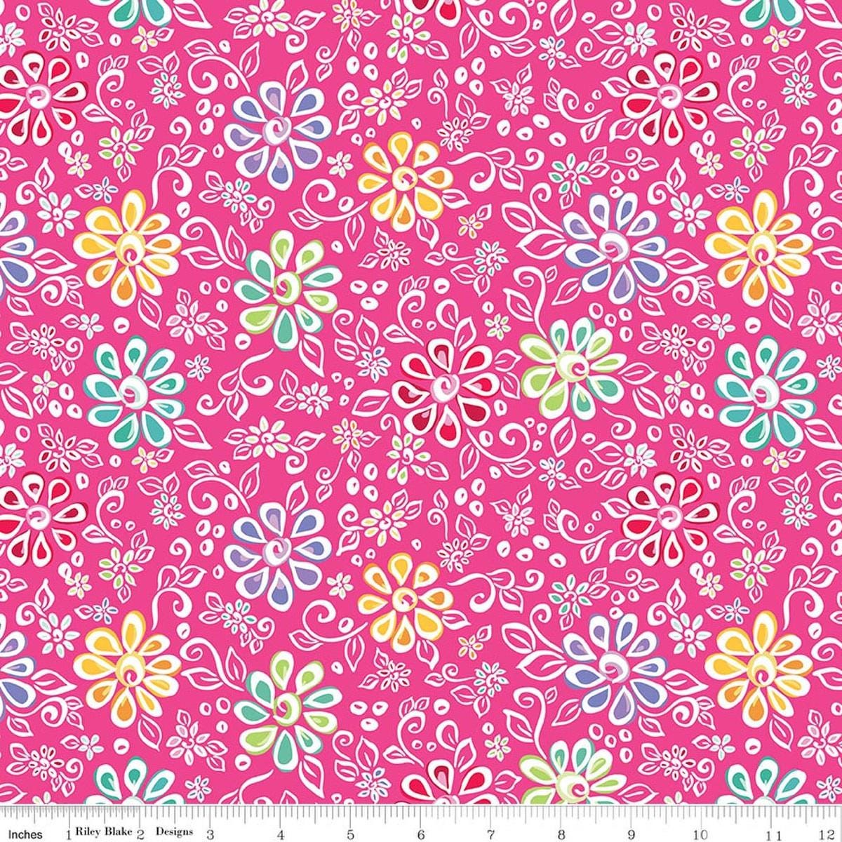 Image of Chasing Rainbows Main Pink quilting cotton fabric by Leslie Ryan for Riley Blake Designs. Features flowers on a pink background. Cute Little Fabric Shop.