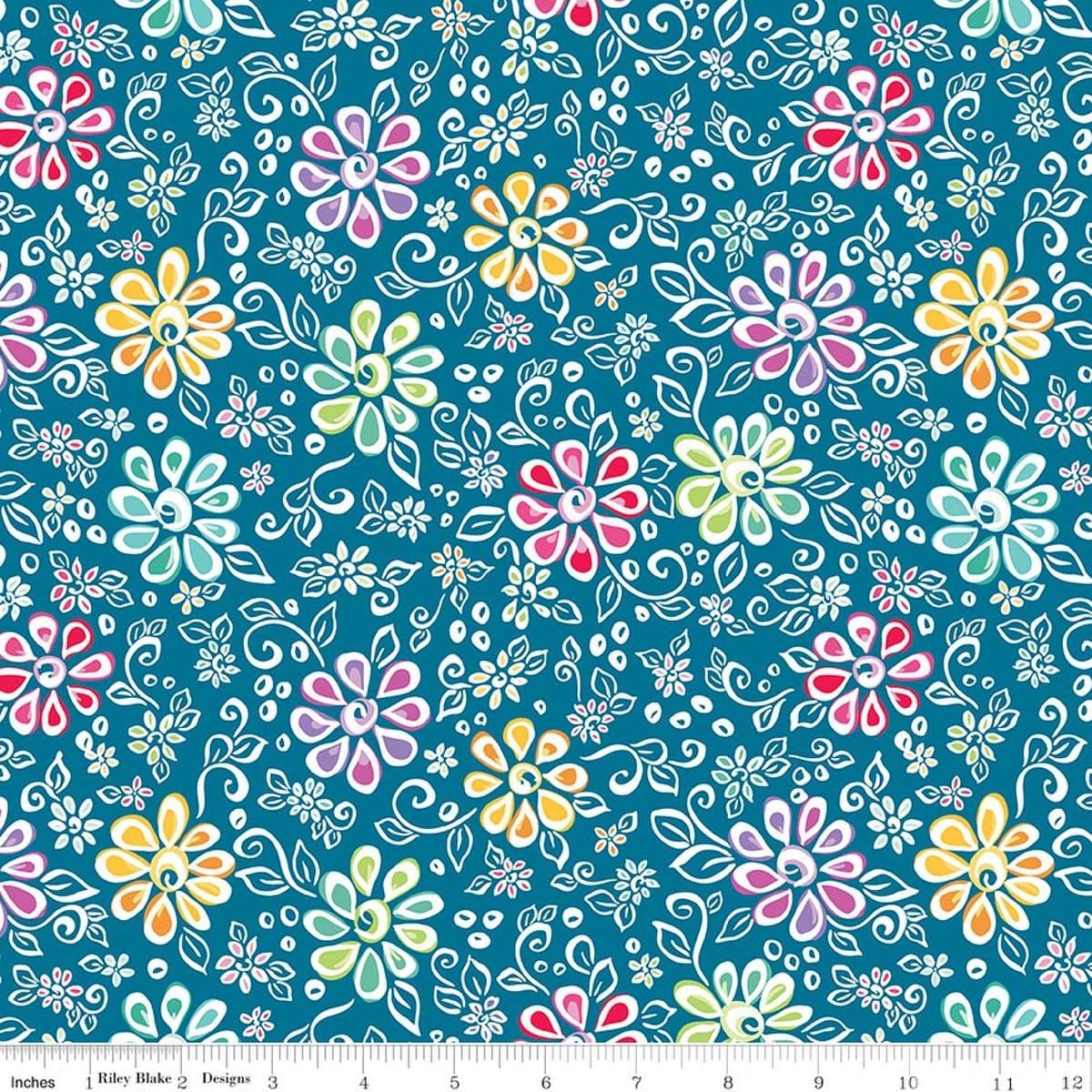 Image of Chasing Rainbows Main Paradise quilting cotton fabric by Leslie Ryan for Riley Blake Designs. Features flowers on a blue background. Cute Little Fabric Shop.