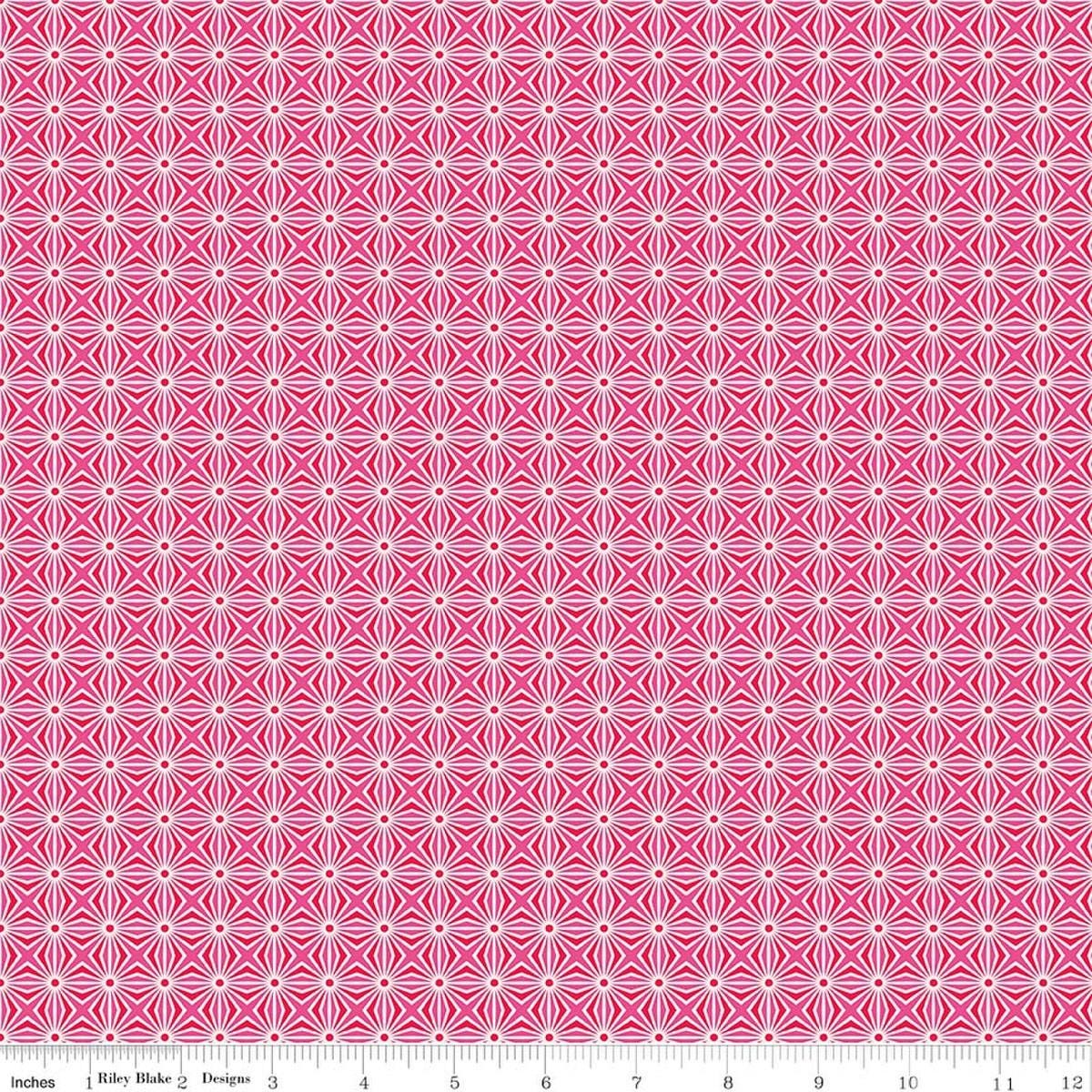 Image of Chasing Rainbows Interlink Pink quilting cotton fabric by Leslie Ryan for Riley Blake Designs. Features a geometric pattern on a pink background. Cute Little Fabric Shop.