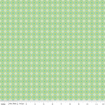 Image of Chasing Rainbows Interlink Green quilting cotton fabric by Leslie Ryan for Riley Blake Designs. Features a geometric pattern on a green background. Cute Little Fabric Shop.