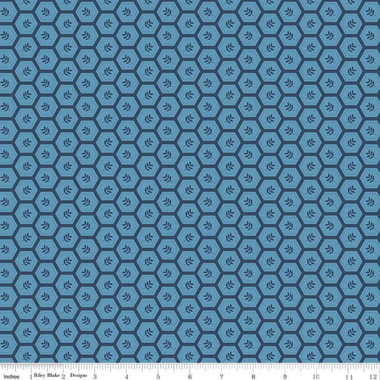 Image of Sunshine & Dandelions Hexies Blue quilting cotton fabric by Traci Reed for Riley Blake Designs. Features a geometric pattern on a blue background. Cute Little Fabric Shop.