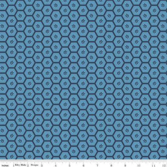 Image of Sunshine & Dandelions Hexies Blue quilting cotton fabric by Traci Reed for Riley Blake Designs. Features a geometric pattern on a blue background. Cute Little Fabric Shop.