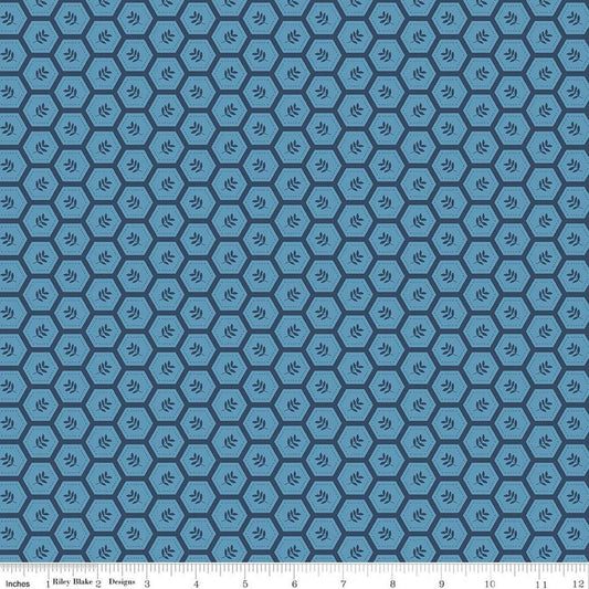 Image of Sunshine & Dandelions Hexies Blue quilting cotton fabric by Traci Reed for Riley Blake Designs. Features a geometric pattern on a blue background. Cute Little Fabric Shop.