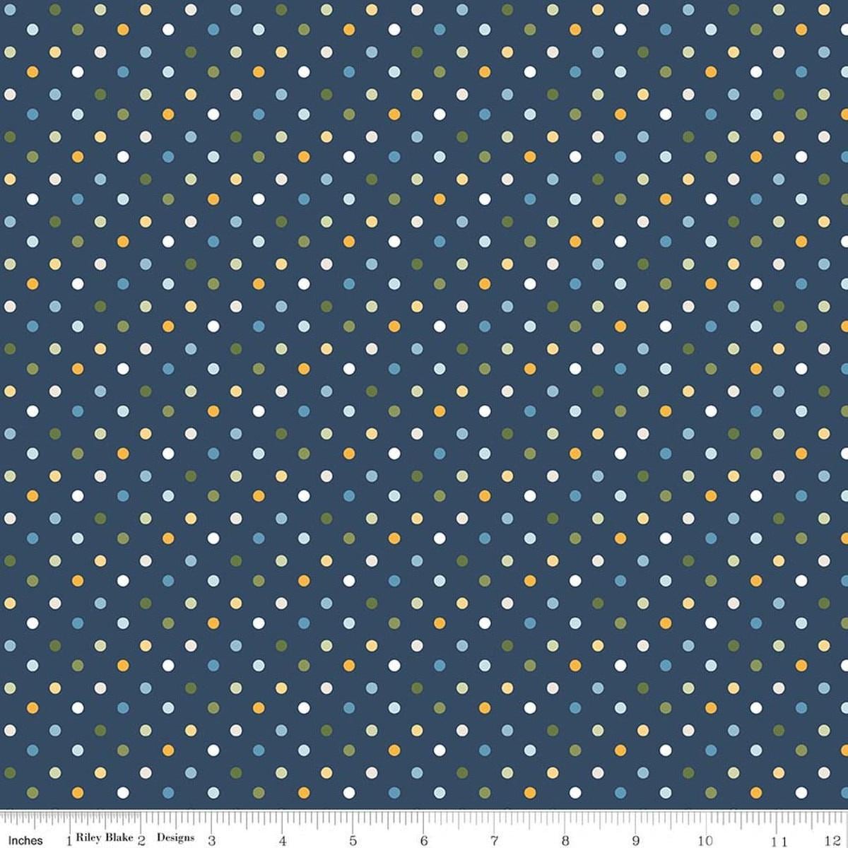 Image of Sunshine & Dandelions Dots Navy quilting cotton fabric by Traci Reed for Riley Blake Designs. Features polka dots on a blue background. Cute Little Fabric Shop.