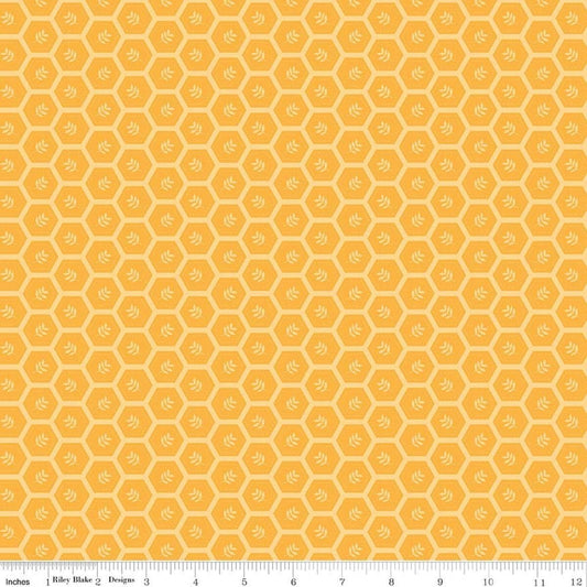 Image of Sunshine & Dandelions Hexies Daisy quilting cotton fabric by Traci Reed for Riley Blake Designs. Features a geometric pattern on a yellow background. Cute Little Fabric Shop.