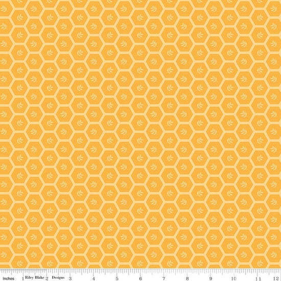 Image of Sunshine & Dandelions Hexies Daisy quilting cotton fabric by Traci Reed for Riley Blake Designs. Features a geometric pattern on a yellow background. Cute Little Fabric Shop.