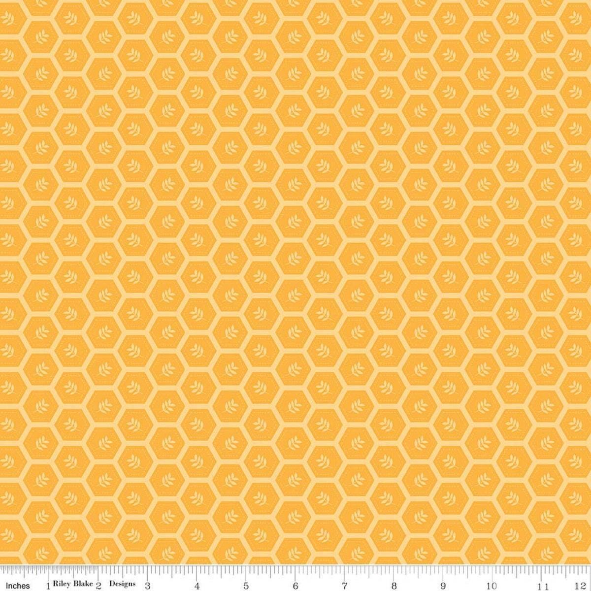 Image of Sunshine & Dandelions Hexies Daisy quilting cotton fabric by Traci Reed for Riley Blake Designs. Features a geometric pattern on a yellow background. Cute Little Fabric Shop.