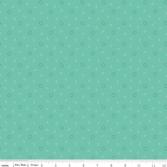Image of Baked With Love Grandma's Pearl Sea Glass quilting cotton fabric by Lori Holt for Riley Blake Designs. Features circles on a blue background. Cute Little Fabric Shop.