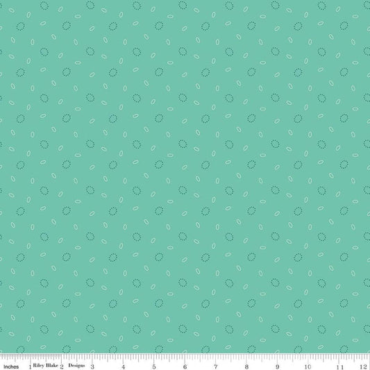 Image of Baked With Love Grandma's Pearl Sea Glass quilting cotton fabric by Lori Holt for Riley Blake Designs. Features circles on a blue background. Cute Little Fabric Shop.