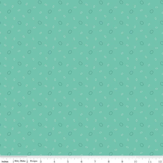 Image of Baked With Love Grandma's Pearl Sea Glass quilting cotton fabric by Lori Holt for Riley Blake Designs. Features circles on a blue background. Cute Little Fabric Shop.