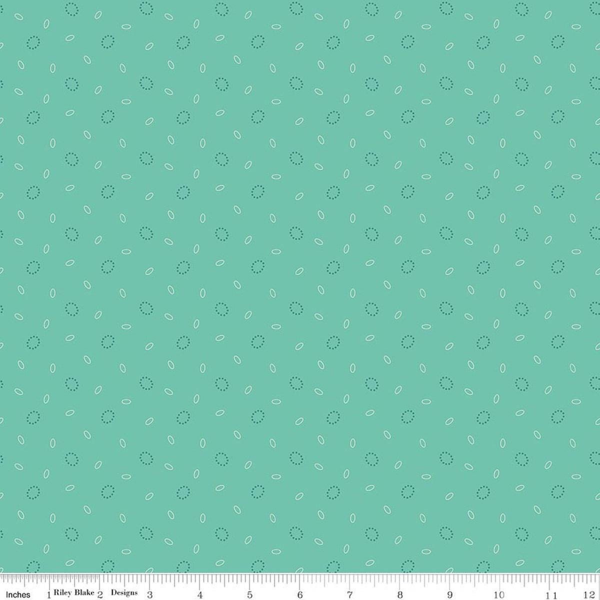 Image of Baked With Love Grandma's Pearl Sea Glass quilting cotton fabric by Lori Holt for Riley Blake Designs. Features circles on a blue background. Cute Little Fabric Shop.