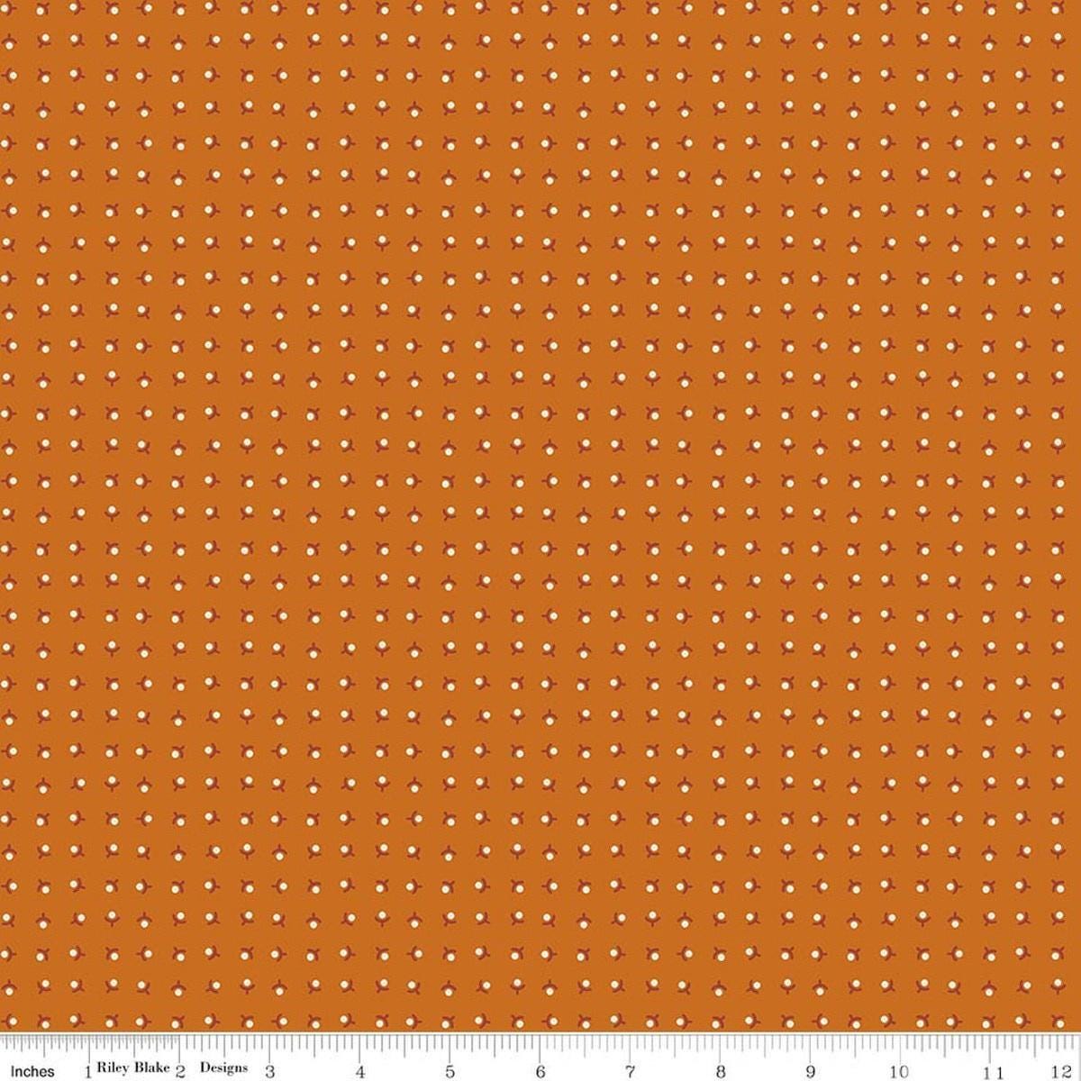 Image of Baked With Love Memories Amber quilting cotton fabric by Lori Holt for Riley Blake Designs. Features acorns on an orange background. Cute Little Fabric Shop.