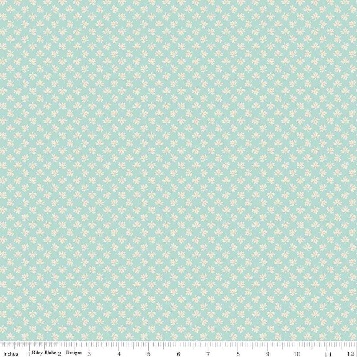 Image of Baked With Love Gathering Songbird quilting cotton fabric by Lori Holt for Riley Blake Designs. Features leaves on a blue background. Cute Little Fabric Shop.
