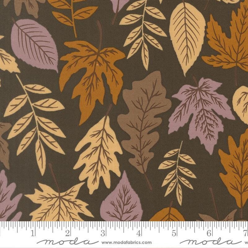 Image of Windfall Leaf Dark Moss quilting cotton fabric by Fancy That Design House for Moda Fabric. Features leaves on a brown background. Cute Little Fabric Shop.