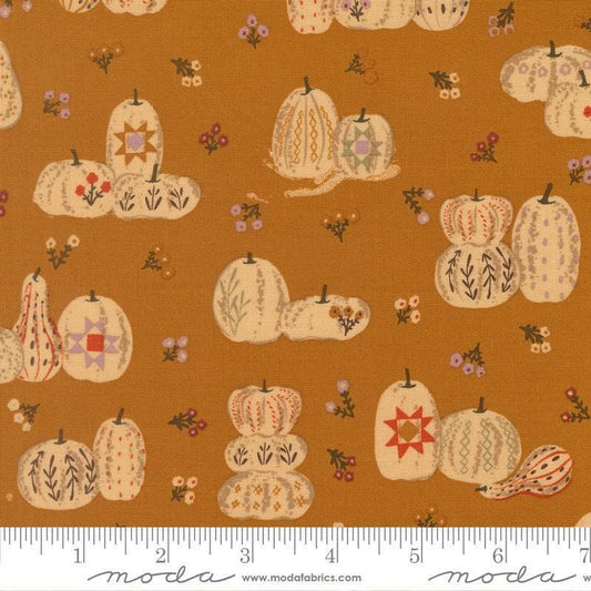 Image of Windfall Pumpkin Patches Caramel quilting cotton fabric by Fancy That Design House for Moda Fabric. Features pumpkins on a brown background. Cute Little Fabric Shop.