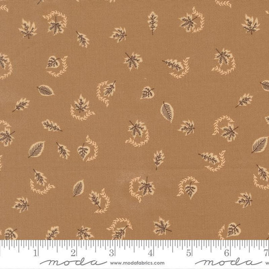 Image of Windfall Autumn Breeze Oatmeal quilting cotton fabric by Fancy That Design House for Moda Fabric. Features leaves on a brown background. Cute Little Fabric Shop.