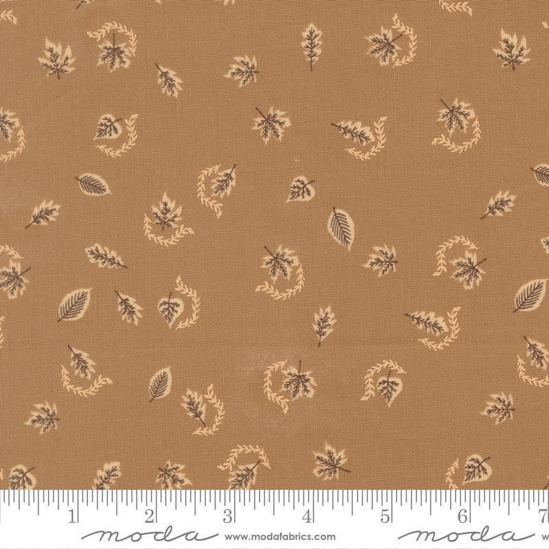 Image of Windfall Autumn Breeze Oatmeal quilting cotton fabric by Fancy That Design House for Moda Fabric. Features leaves on a brown background. Cute Little Fabric Shop.