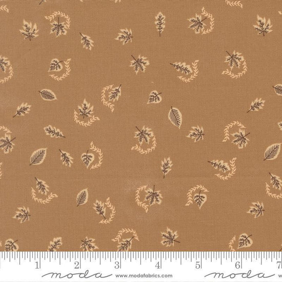 Image of Windfall Autumn Breeze Oatmeal quilting cotton fabric by Fancy That Design House for Moda Fabric. Features leaves on a brown background. Cute Little Fabric Shop.