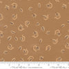 Image of Windfall Autumn Breeze Oatmeal quilting cotton fabric by Fancy That Design House for Moda Fabric. Features leaves on a brown background. Cute Little Fabric Shop.