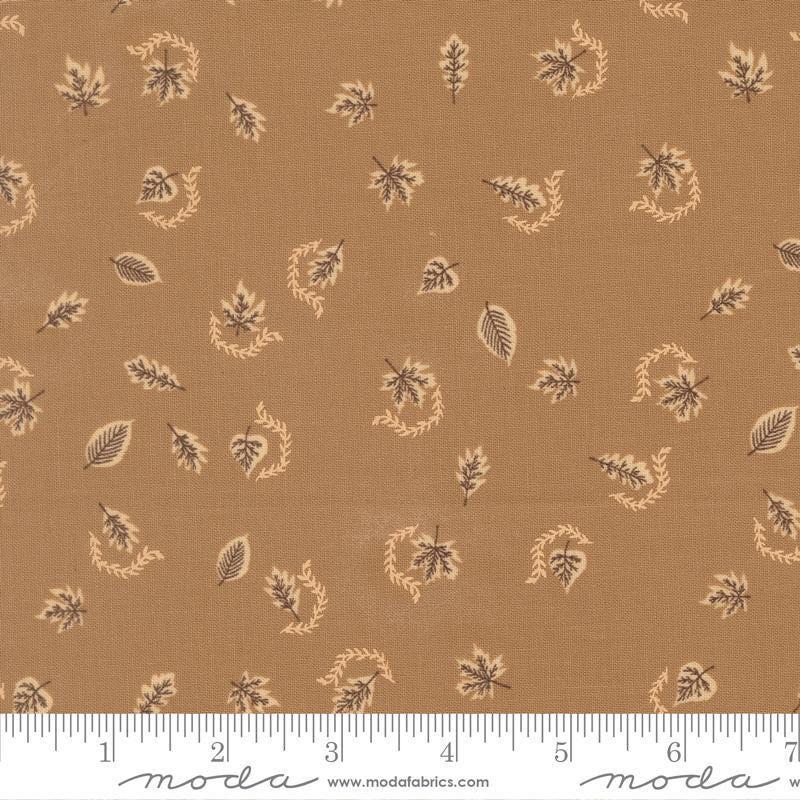 Image of Windfall Autumn Breeze Oatmeal quilting cotton fabric by Fancy That Design House for Moda Fabric. Features leaves on a brown background. Cute Little Fabric Shop.