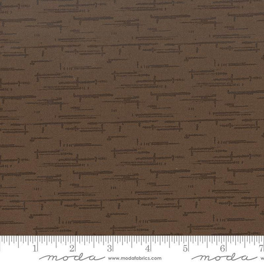 Image of Windfall Texture Blender Coffee quilting cotton fabric by Fancy That Design House for Moda Fabric. Features printed texture on a brown background. Cute Little Fabric Shop.