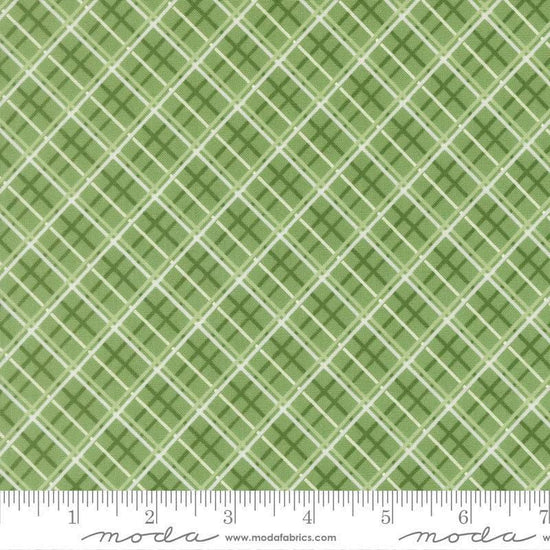 Image of Merrily on High Pretty Plaid Evergreen quilting cotton fabric by Sweetfire Road for Moda Fabrics. Features plaid on a green background. Cute Little Fabric Shop.