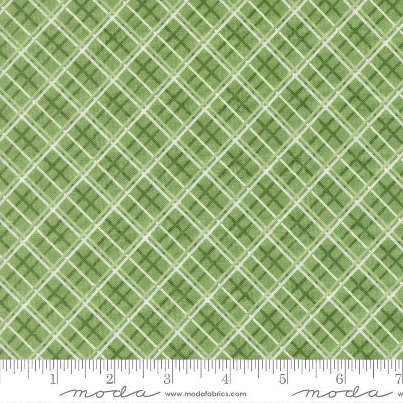 Image of Merrily on High Pretty Plaid Evergreen quilting cotton fabric by Sweetfire Road for Moda Fabrics. Features plaid on a green background. Cute Little Fabric Shop.