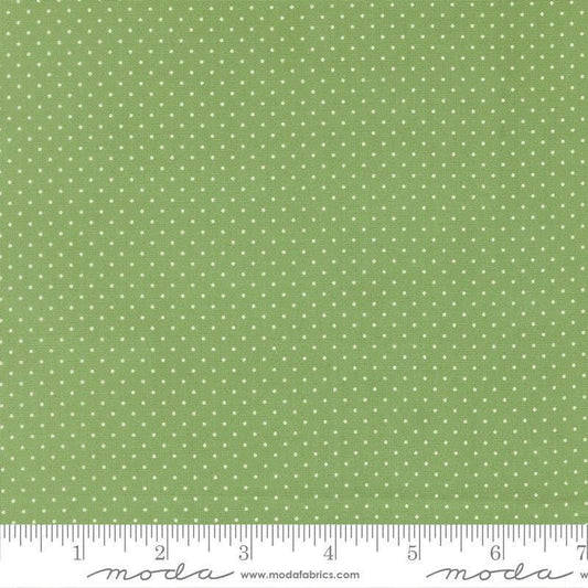 Image of Merrily on High Festive Dot Evergreen quilting cotton fabric by Sweetfire Road for Moda Fabrics. Features polka dots on a green background. Cute Little Fabric Shop.