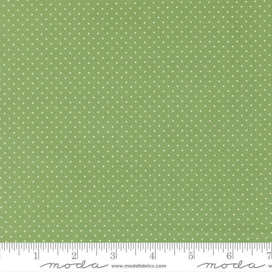 Image of Merrily on High Festive Dot Evergreen quilting cotton fabric by Sweetfire Road for Moda Fabrics. Features polka dots on a green background. Cute Little Fabric Shop.