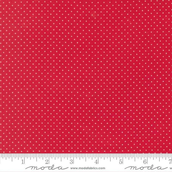Image of Merrily on High Festive Dot Christmas Red quilting cotton fabric by Sweetfire Road for Moda Fabrics. Features polka dots on a red background. Cute Little Fabric Shop.