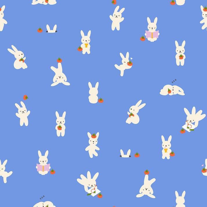 Image of Persimmon Bun E and Sammy Lindley Blue quilting cotton fabric by Rashida Coleman Hale of Ruby Star Society for Moda Fabrics. Features bunnies on a blue background. Cute Little Fabric Shop.