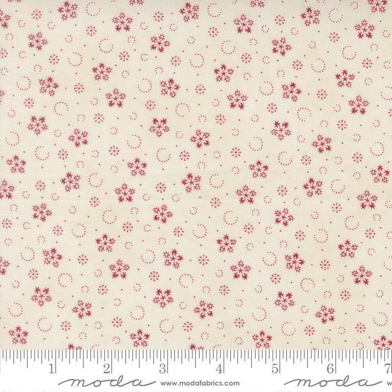 Image of Candlelight Christmas Festive Flurries Cream quilting cotton fabric by 3 Sisters for Moda Fabrics. Features snowflakes on a cream background. Cute Little Fabric Shop.