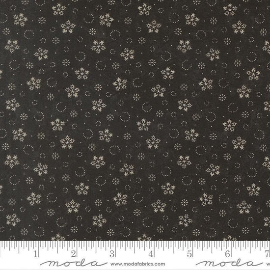 Image of Candlelight Christmas Festive Flurries Ebony quilting cotton fabric by 3 Sisters for Moda Fabrics. Features snowflakes on a black background. Cute Little Fabric Shop.