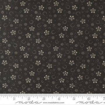 Image of Candlelight Christmas Festive Flurries Ebony quilting cotton fabric by 3 Sisters for Moda Fabrics. Features snowflakes on a black background. Cute Little Fabric Shop.