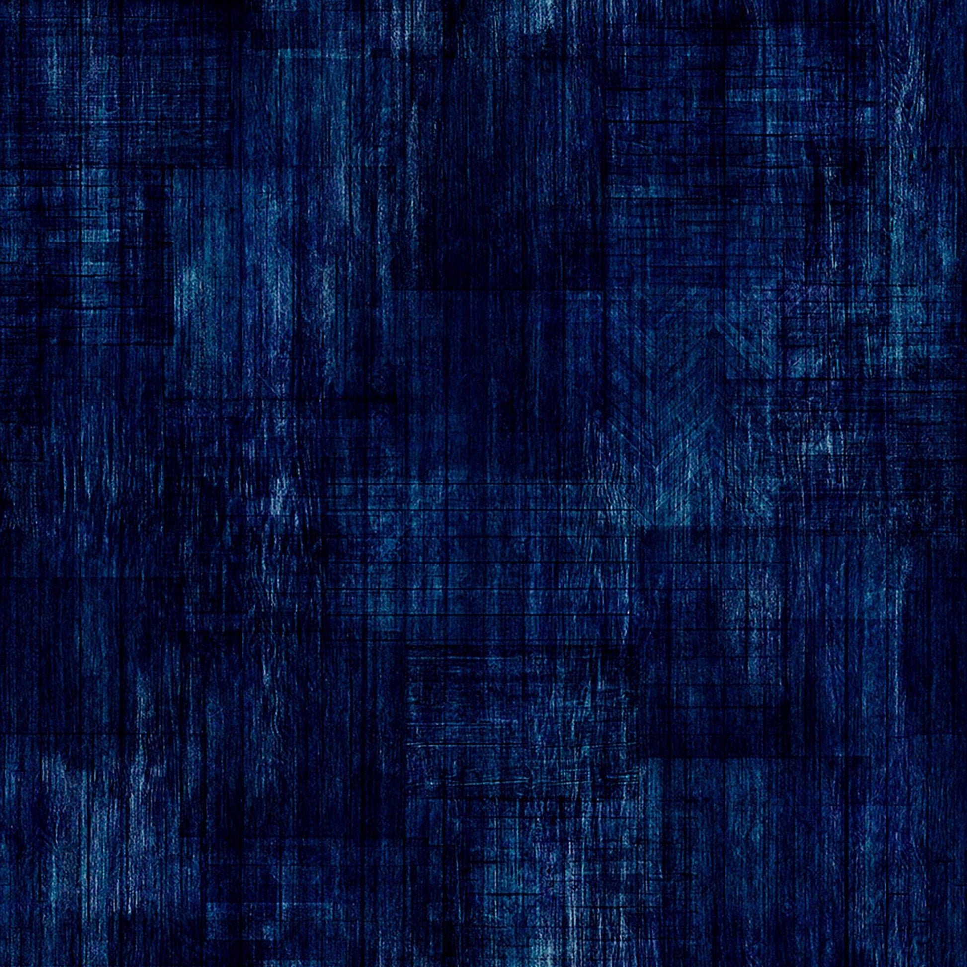 Image of Into The Woods Wood Texture Dark Denim quilting cotton fabric by Morris Creative Group for QT Fabrics. Features printed wood texture on a blue background. Cute Little Fabric Shop.