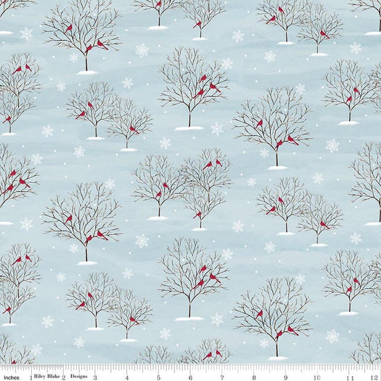 Image of Covered Bridges in Winter Trees Iceberg quilting cotton fabric by Tara Reed for Riley Blake Designs. Features trees on a blue background. Cute Little Fabric Shop.