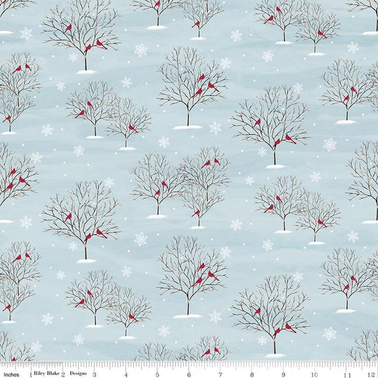 Image of Covered Bridges in Winter Trees Iceberg quilting cotton fabric by Tara Reed for Riley Blake Designs. Features trees on a blue background. Cute Little Fabric Shop.