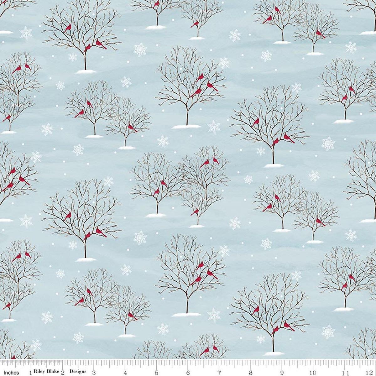Image of Covered Bridges in Winter Trees Iceberg quilting cotton fabric by Tara Reed for Riley Blake Designs. Features trees on a blue background. Cute Little Fabric Shop.