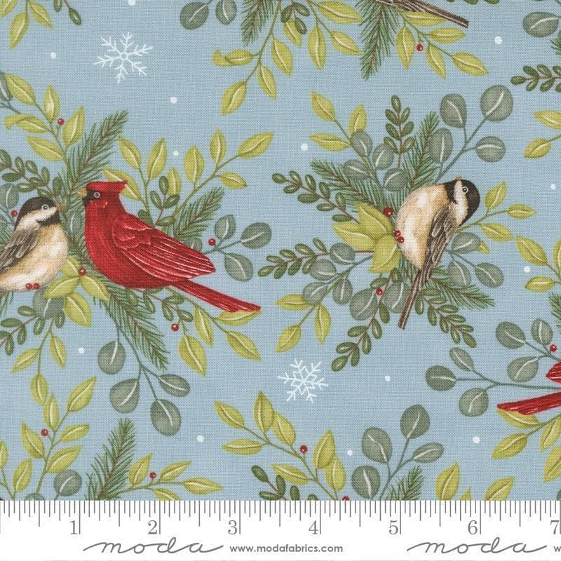 Image of When Snow Falls Winter Birds Winter Sky quilting cotton fabric by Deb Strain for Moda Fabrics. Features birds and leaves on a blue background. Cute Little Fabric Shop.