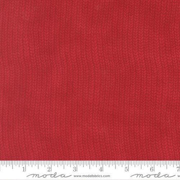 Image of When Snow Falls Stocking Weave Berry Red quilting cotton fabric by Deb Strain for Moda Fabrics. Features printed tonal knitting texture on a red background. Cute Little Fabric Shop.
