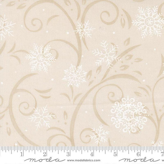 Image of When Snow Falls Swirling Snowflakes Snowy White quilting cotton fabric by Deb Strain for Moda Fabrics. Features snowflakes and swirls on a cream background. Cute Little Fabric Shop.