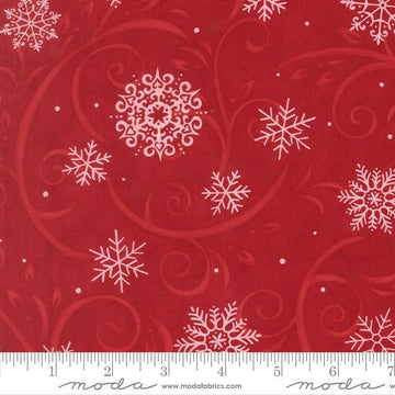 Image of When Snow Falls Swirling Snowflakes Berry Red quilting cotton fabric by Deb Strain for Moda Fabrics. Features snowflakes and swirls on a red background. Cute Little Fabric Shop.
