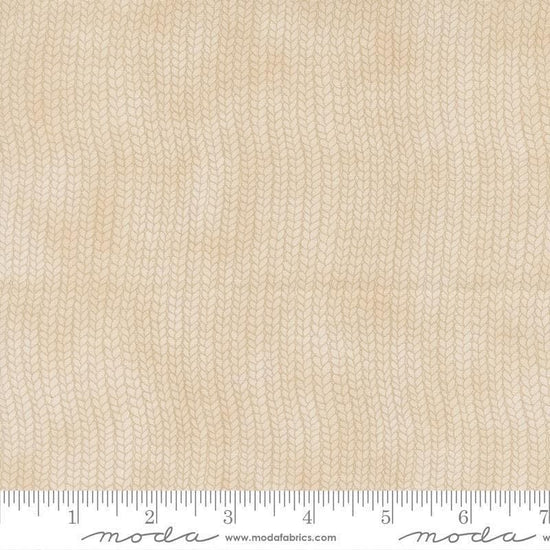 Image of When Snow Falls Stocking Weave Snowy White quilting cotton fabric by Deb Strain for Moda Fabrics. Features printed tonal knitting texture on a cream background. Cute Little Fabric Shop.