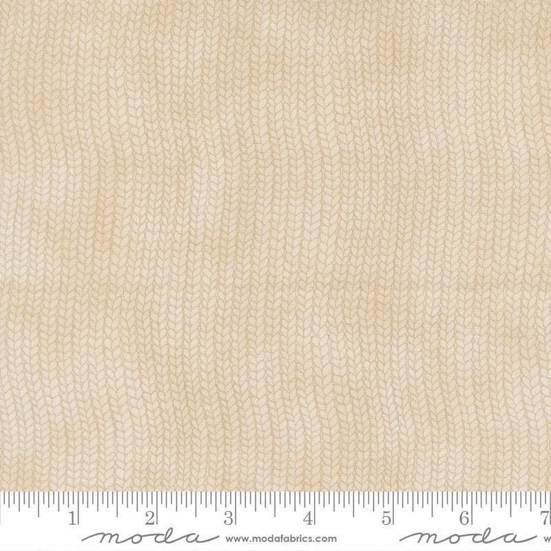 Image of When Snow Falls Stocking Weave Snowy White quilting cotton fabric by Deb Strain for Moda Fabrics. Features printed tonal knitting texture on a cream background. Cute Little Fabric Shop.