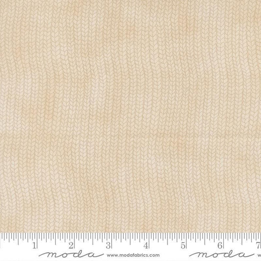 Image of When Snow Falls Stocking Weave Snowy White quilting cotton fabric by Deb Strain for Moda Fabrics. Features printed tonal knitting texture on a cream background. Cute Little Fabric Shop.